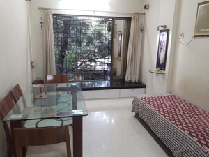 Living Room in 1 BHK Apartment at Vile Parle West – for Rent