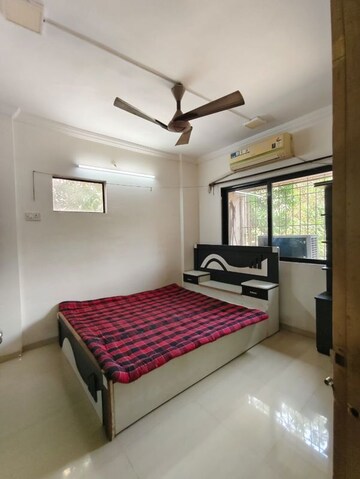 Bedroom in 1 BHK Apartment at Unnati Woods CHS, Kasarvadavali – for Rent