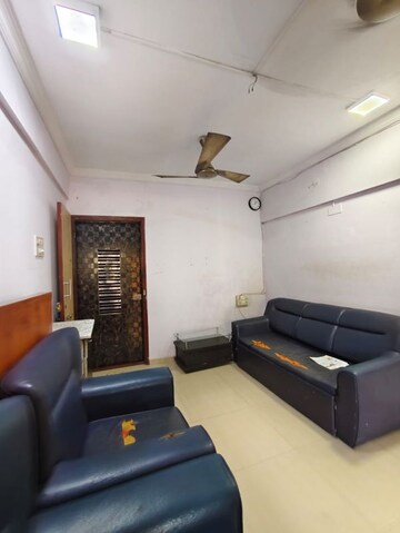 Living Room in 1 BHK Apartment at Unnati Woods CHS, Kasarvadavali – for Rent