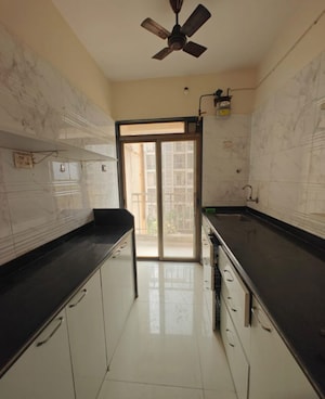 Kitchen in 2 BHK Apartment at Nand Sai Ganesh CHS Sector 50 Seawoods, Seawoods – for Rent