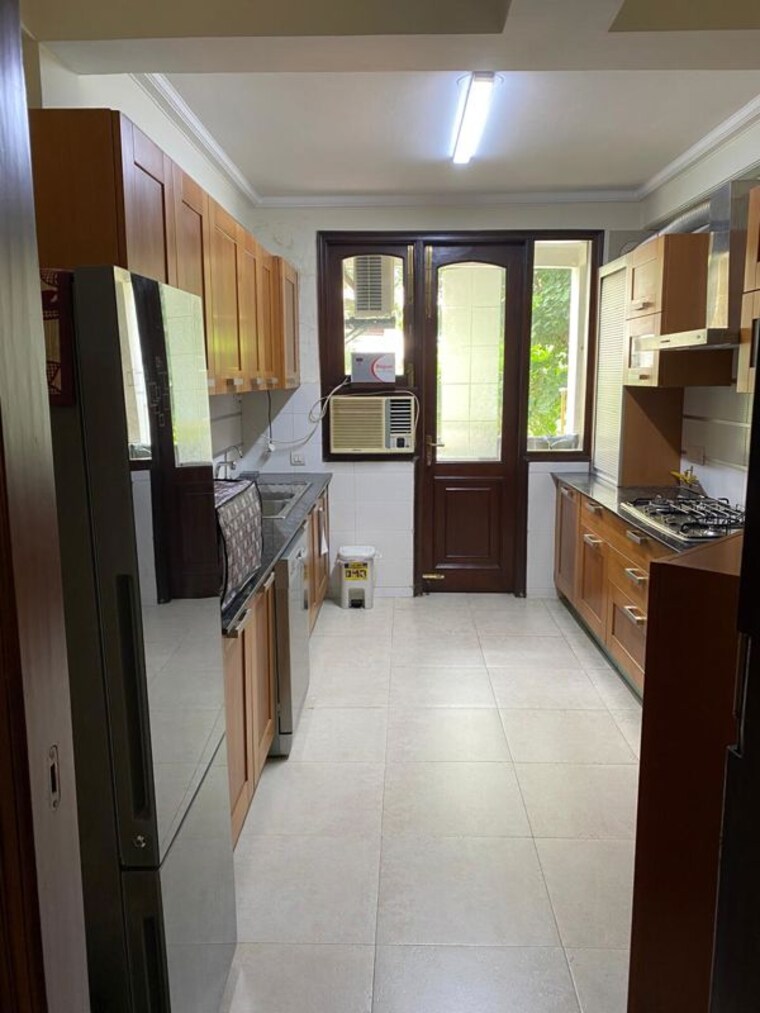 Kitchen, ambience-island-lagoon 3 Bedroom 2416 Sq.Ft. Apartment In Sector 24 Gurgaon 10128541