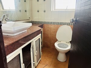 Bathroom in 2 BHK Apartment at Eros Wembley Premium Tower, Sector 49 – for Rent