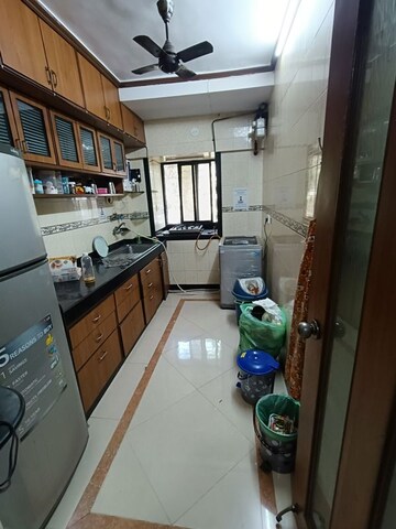 Kitchen in 2 BHK Apartment at Shree Amit Nagar CHS, Andheri West – for Rent
