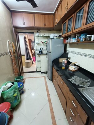 Kitchen in 2 BHK Apartment at Shree Amit Nagar CHS, Andheri West – for Rent