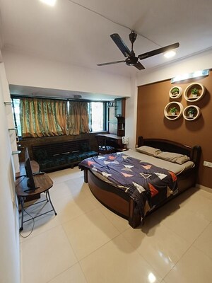 Bedroom in 2 BHK Apartment at Shree Amit Nagar CHS, Andheri West – for Rent