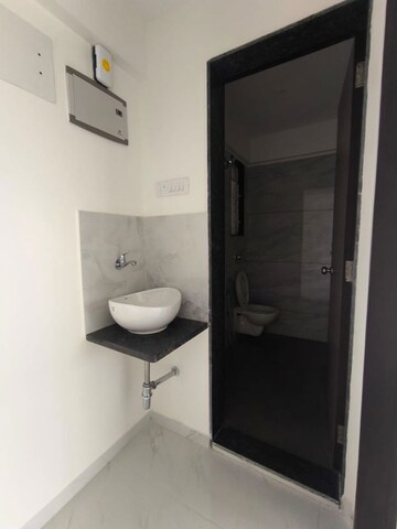Bathroom in 1 BHK Apartment at Metropolis Bayside, Kasarvadavali – for Rent