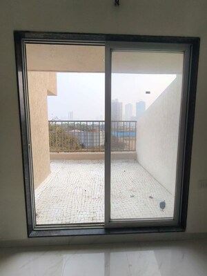 Living Room in 1 BHK Apartment at Metropolis Bayside, Kasarvadavali – for Rent