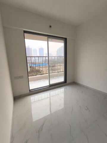 Master Bedroom in 1 BHK Apartment at Metropolis Bayside, Kasarvadavali – for Rent