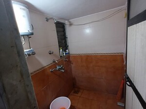 Bathroom in 1 BHK Apartment at Puraniks Kanchanpushp Complex, Kavesar – for Sale