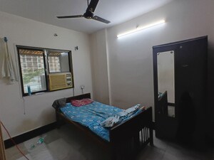 Bedroom in 1 BHK Apartment at Puraniks Kanchanpushp Complex, Kavesar – for Sale