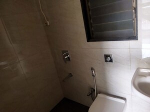 Bathroom in 1 BHK Apartment at Chandak 34 Park Estate, Goregaon West – for Rent