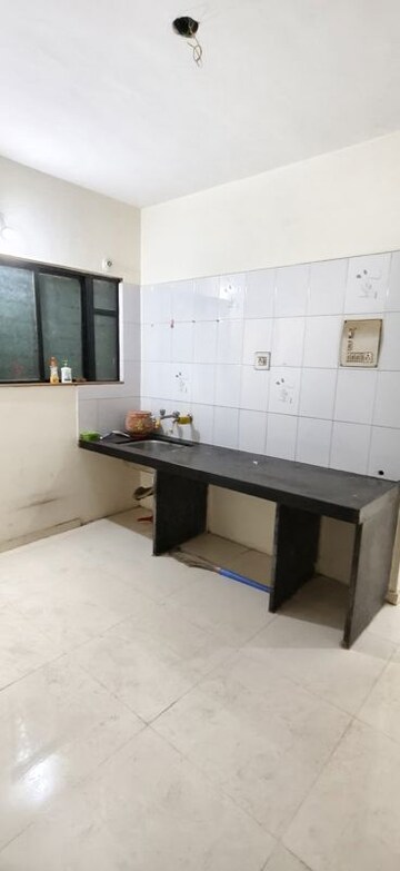 Kitchen in 2 BHK Apartment at Wadgaon Sheri – for Rent