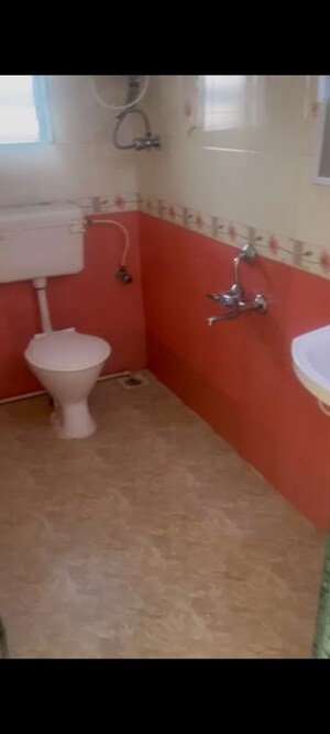 Bathroom in 2 BHK Apartment at Jawaharban CHS, Andheri West – for Rent