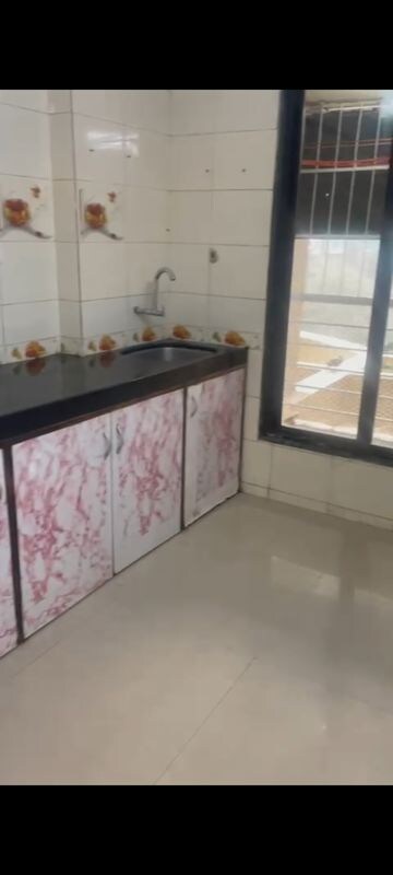 Kitchen in 2 BHK Apartment at Jawaharban CHS, Andheri West – for Rent