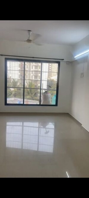 Room in 2 BHK Apartment at Jawaharban CHS, Andheri West – for Rent
