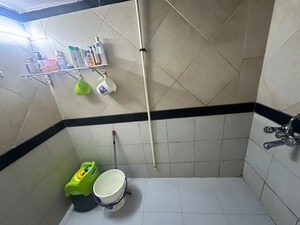 Bathroom in 2.5 BHK Apartment at Ratnagar CHS, Andheri West – for Rent