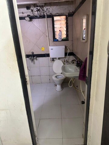 Bathroom in 2.5 BHK Apartment at Ratnagar CHS, Andheri West – for Rent