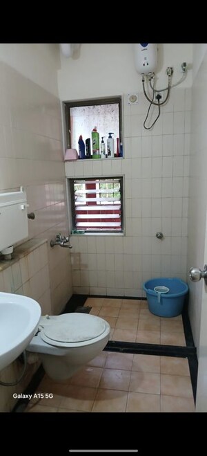 Bathroom in 2 BHK Apartment at Mangalam CHS Malad, Govind Nagar – for Rent