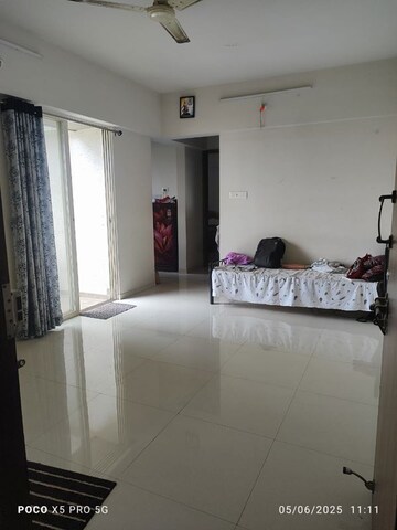 Living Room in 1 BHK Apartment at Sterling Blooms, Rahatani – for Sale