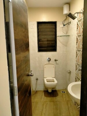 Bathroom in 2 BHK Apartment at Riverdale Tower, Andheri East – for Rent