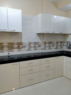 Kitchen in 2 BHK Apartment at Riverdale Tower, Andheri East – for Rent