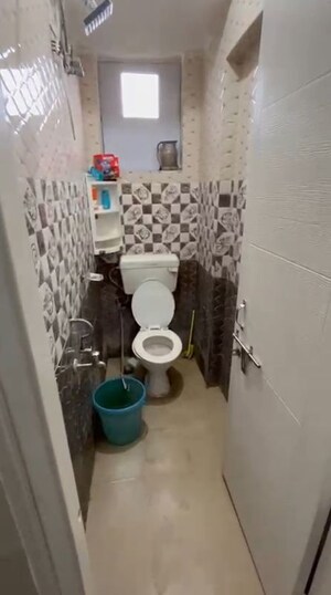 Bathroom in 1 RK Apartment at DLF New Town Heights II, Sector 86 – for Rent