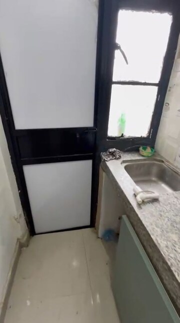 Kitchen in 1 RK Apartment at DLF New Town Heights II, Sector 86 – for Rent