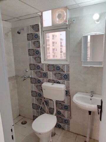 Bathroom in 2 BHK Apartment at Signature Global Proxima, Sector 89 – for Rent