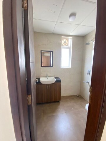 Bathroom in 2.5 BHK Builder Floor at Smart World Gems, Sector 89 – for Rent