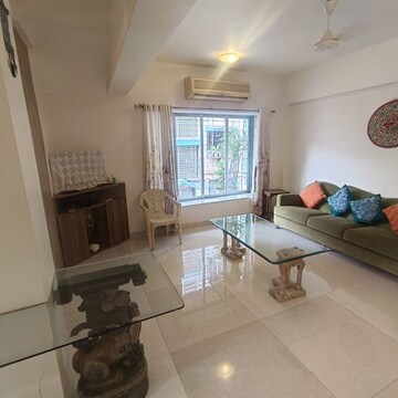 Living Room in 1 BHK Apartment at North Bombay Society, Juhu – for Rent