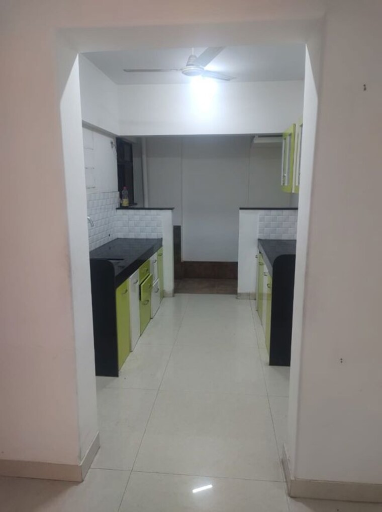 Kitchen, atul-western-hills-phase-2 2.5 Bedroom 1000 Sq.Ft. Apartment In Baner Pune 10128978