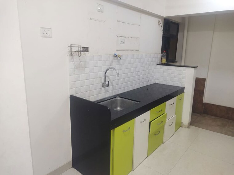 Kitchen, atul-western-hills-phase-2 2.5 Bedroom 1000 Sq.Ft. Apartment In Baner Pune 10128978