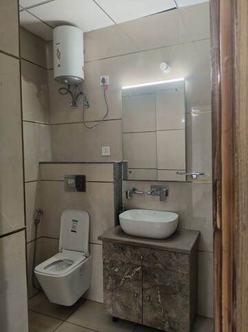 Bathroom in 3 BHK Builder Floor at Hong Kong Bazaar, Sector 57 – for Rent