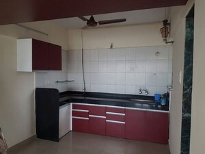 Kitchen in 3 BHK Apartment at Ganesham Phase I, Pimple Saudagar – for Rent