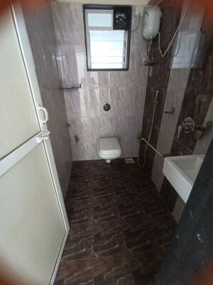 Bathroom in 1 BHK Apartment at Lotus Lotus Link Square, Malad West – for Rent