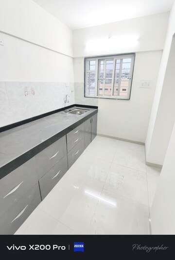 Kitchen in 2 BHK Apartment at Wadgaon Sheri – for Rent