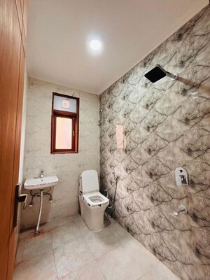 Bathroom in 2 BHK Builder Floor at Freedom Fighters Enclave – for Rent