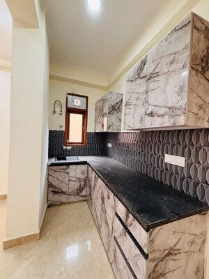 Kitchen in 2 BHK Builder Floor at Freedom Fighters Enclave – for Rent