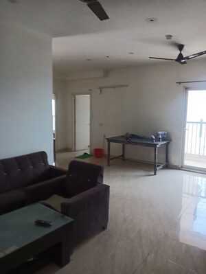 Living Room in 4 BHK Apartment at Gaur Yamuna City, Gaur Yamuna City – for Rent