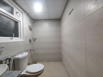 Bathroom in 2 BHK Apartment at Bhartiya City Nikoo Homes II, Thanisandra Main Road – for Rent