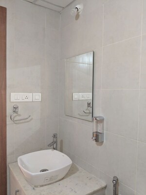Bathroom in 2 BHK Apartment at Bhartiya City Nikoo Homes II, Thanisandra Main Road – for Rent