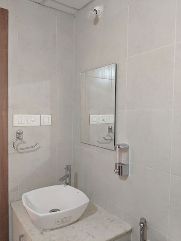 Bathroom in 2 BHK Apartment at Bhartiya City Nikoo Homes II, Thanisandra Main Road – for Rent