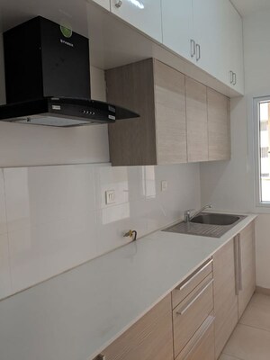 Kitchen in 2 BHK Apartment at Bhartiya City Nikoo Homes II, Thanisandra Main Road – for Rent