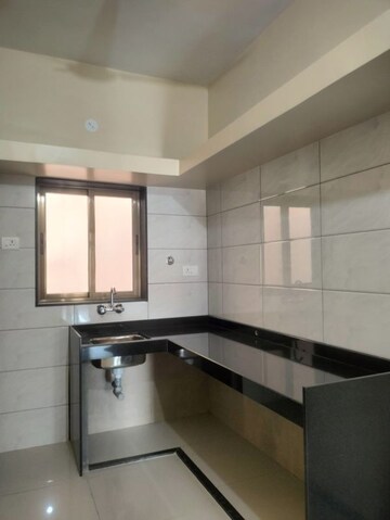 Kitchen in 1 BHK Apartment at Wadgaon Sheri – for Rent