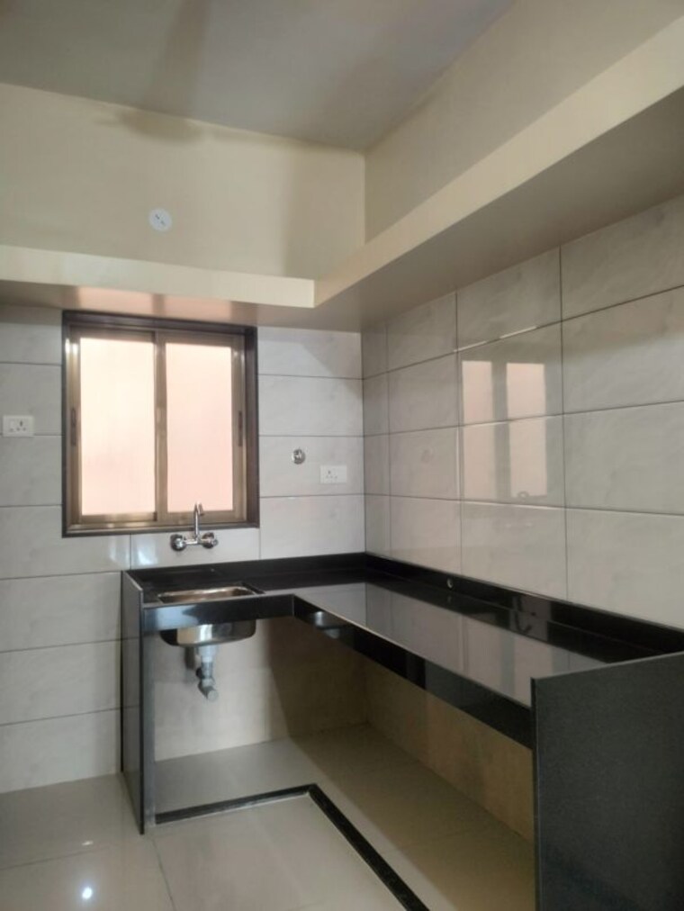 Kitchen, wadgaon sheri 1 Bedroom 600 Sq.Ft. Apartment In Wadgaon Sheri Pune 10129188