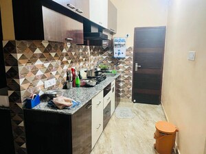 Kitchen in 2 BHK Apartment at Baguiati – for Sale