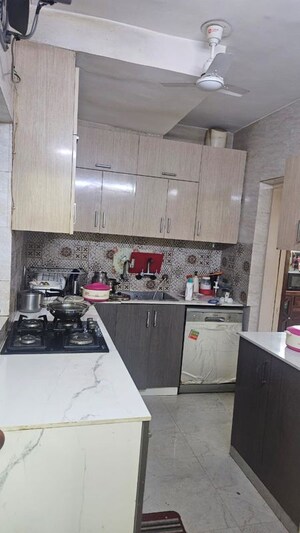 Kitchen in 2 BHK Apartment at Arun Vihar Sector 37, Sector 37 – for Rent