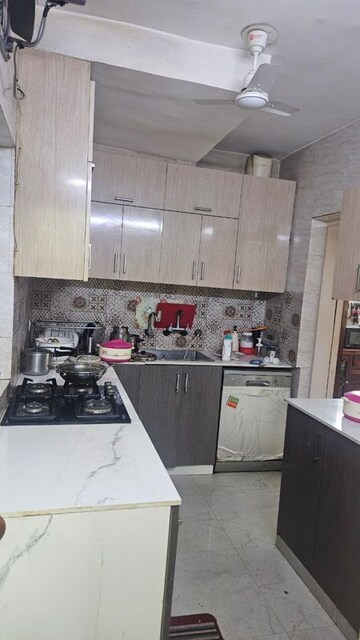 Kitchen in 2 BHK Apartment at Arun Vihar Sector 37, Sector 37 – for Rent
