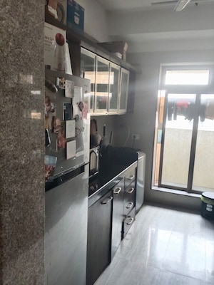 Kitchen in 2.5 BHK Apartment at Sheth Vasant Oasis, Andheri East – for Rent