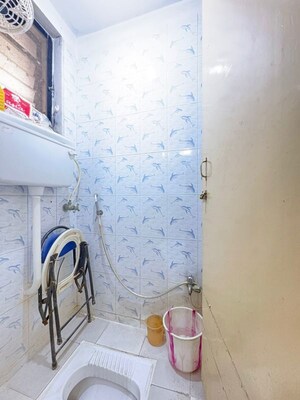 Bathroom in 1 BHK Apartment at Rajnigandha CHS Vasant Vihar, Vasant Vihar – for Sale